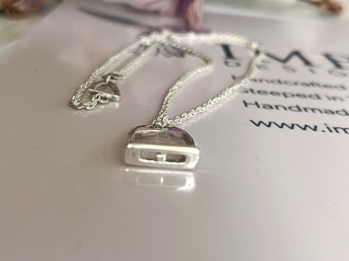 Stirrup pendant