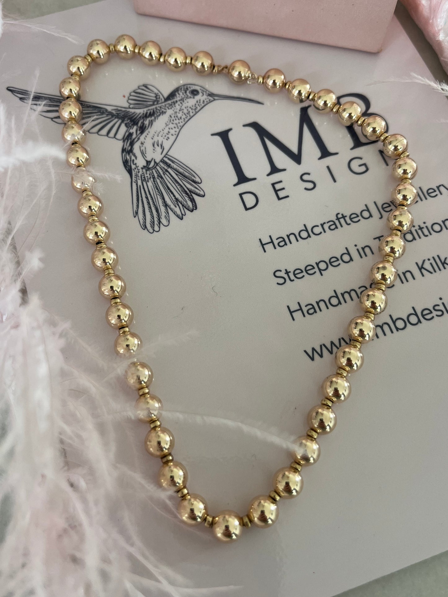 Gold ball necklace