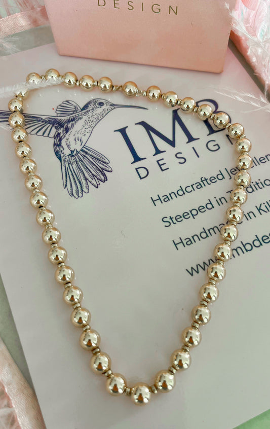 Gold ball necklace